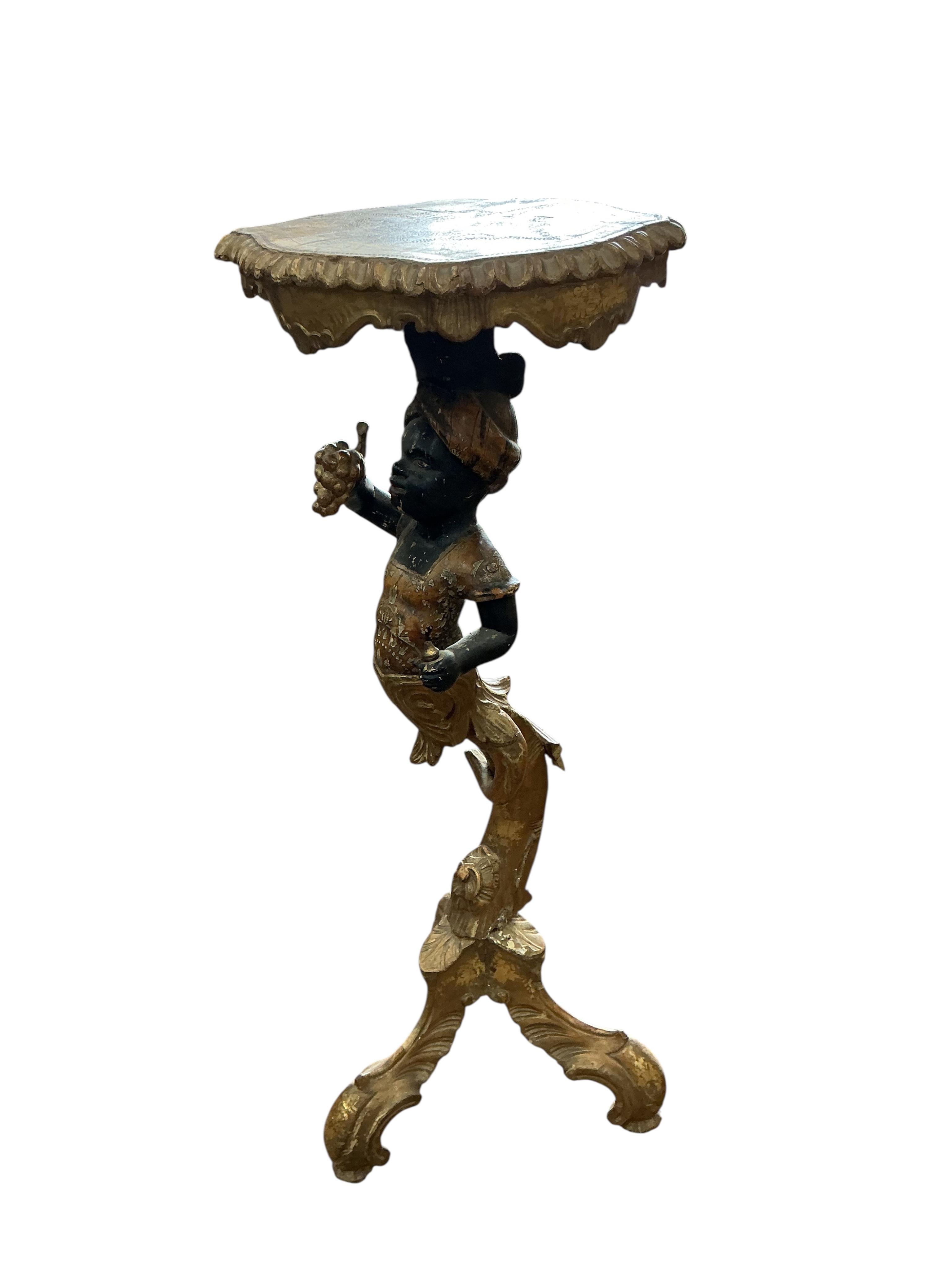 A Venetian polychrome carved wood Blackamoor torchere stand, height 96cm